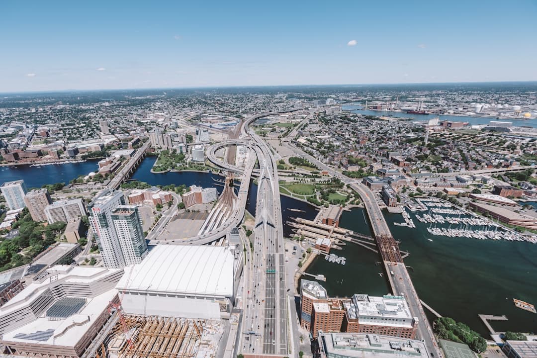 Aerial view of a busy highway interchange in a city. — Photo by Colin OBrien on Unsplash